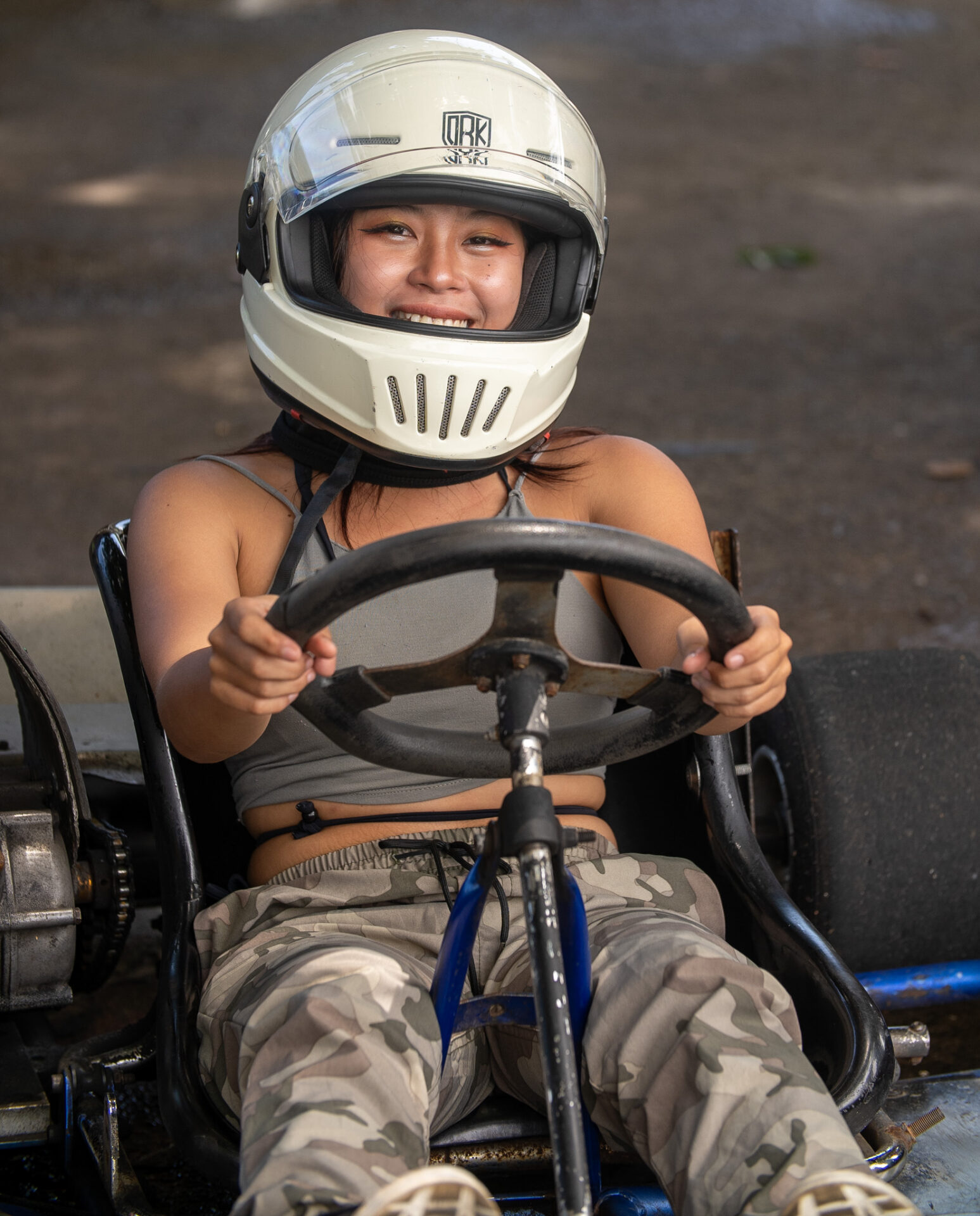 Visitor driving a go-kart at Panglao Kartways, an exciting outdoor racing attraction in Panglao, Bohol.