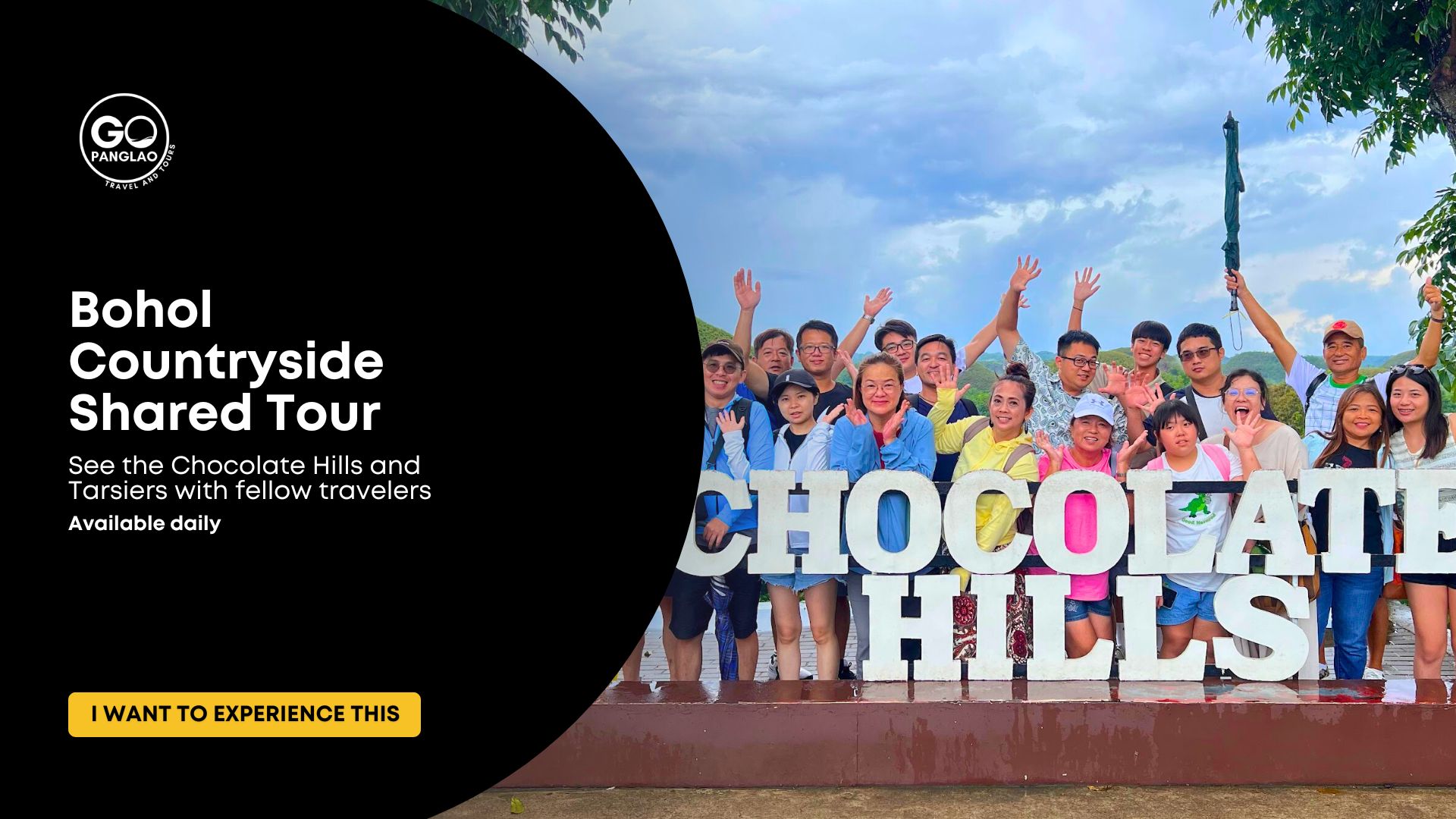 Group of travelers posing at the Chocolate Hills during a Bohol Countryside Shared Tour
